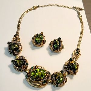 SOLD.    Vintage Green Carnival glass necklace and clip earrings